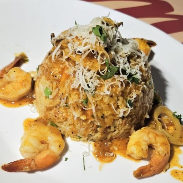 Savor our arroz con mariscos
